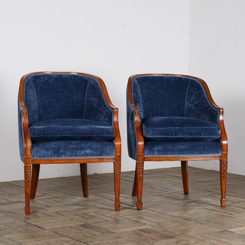 A Pair Of Tub Chairs In Royal Blue By Fine Furniture Maker Arthur Brett