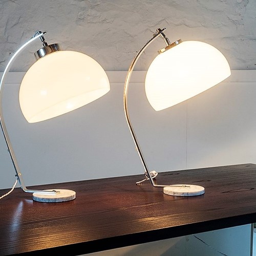 A pair of mid-century italian arc table lamps 1970