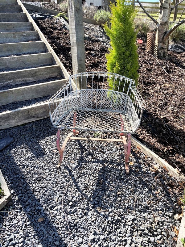 1920s wirework garden seat with scroll iron feet -greencore-design-weathered-wirework-garden-seat-chair-3-main-637541598855882291.jpg