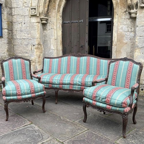 Antique French Louis XV Revival Carved Walnut Three Seat Sofa And Armchairs