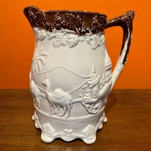 Victorian Yorkshire Pottery Jug Moulded With An Indian Carriage Scene