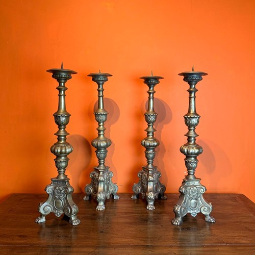 Set Of Four French Brass Ecclesiastical Pricket Candlesticks