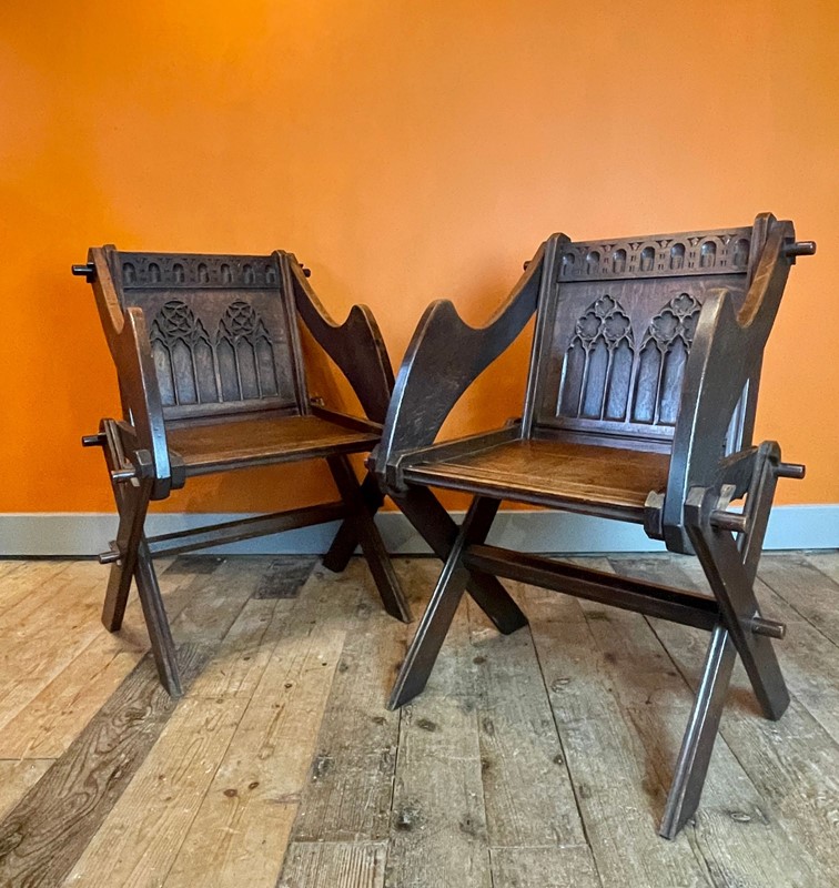 Pair of Victorian Gothic Oak Glastonbury Chairs-hand-of-glory-1-cd86ea63-c41d-477b-8bea-87eba7a7a482-1-201-a-main-638017119960190843.jpeg
