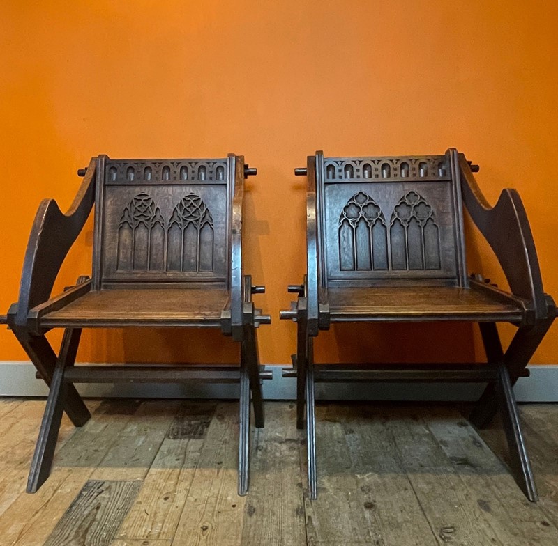 Pair of Victorian Gothic Oak Glastonbury Chairs-hand-of-glory-4-b35ff8e7-82f7-407f-ae7c-6b2d08f6c8dd-1-201-a-main-638017120831809220.jpeg