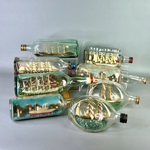 Collection Of Dioramas Of Ships In Bottles