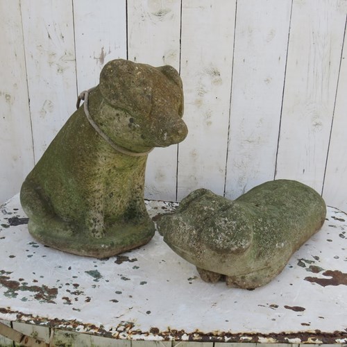 Two Large Weathered Garden Pigs
