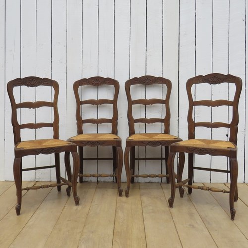 Set Of Four French Oak & Rush Seated Dining Chairs