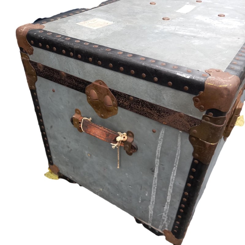 Large early C20th metal travelling trunk-hayles-hayles-metal-trunk-side-main-638017766729907120-large-clipped-rev-1-main-638018614323410427.jpeg