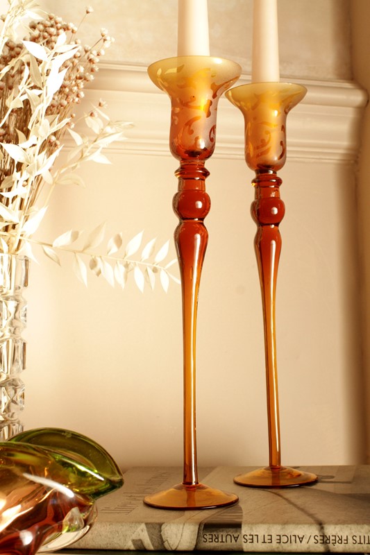 A Pair Of Elegant Amber Glass Candleholders-house-of-hummingbird-38a47c30-ac77-45a1-8e1e-410b7263ebdf-main-638034230950769101.jpeg