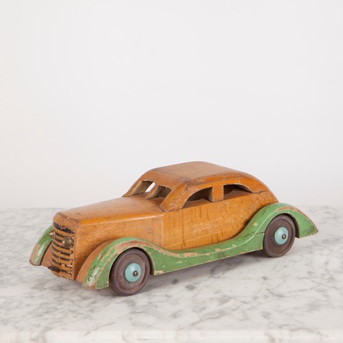 A Small, Vintage Wooden Pull-Along Toy Car