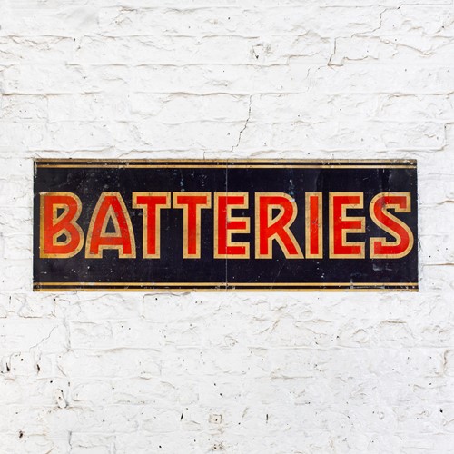 Charming, early batteries tin sign
