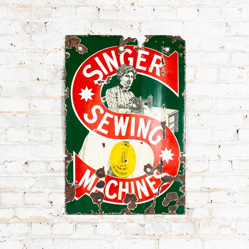 Singer sewing machines pictorial enamel sign