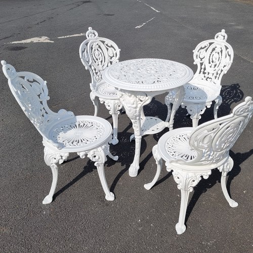 Heavy Cast-Iron Set Of Garden Table And Four Chairs