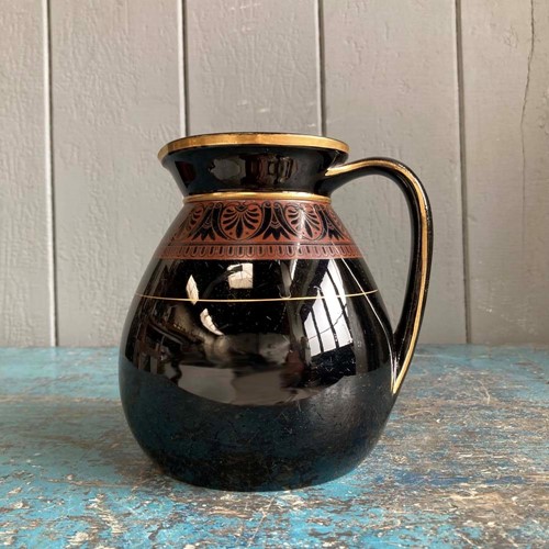 Antique pottery black jug