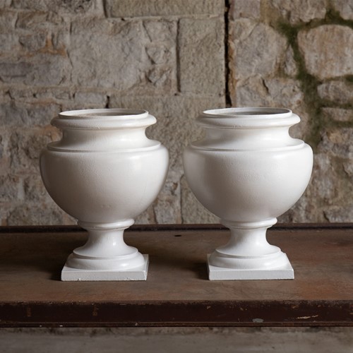 White-Painted Cast Iron Urns