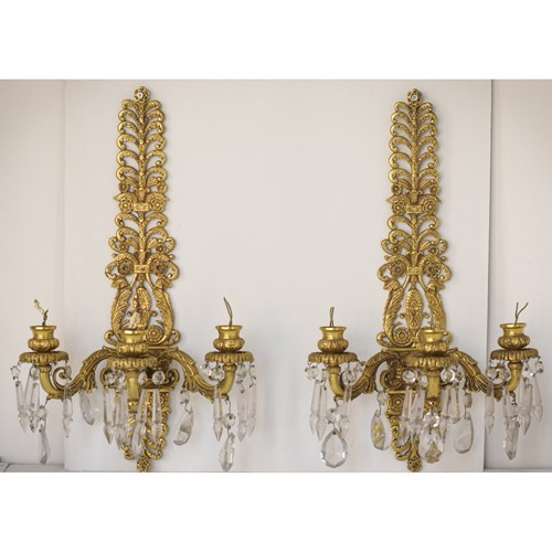 Two Bronze and Cut Glass Wall-Mounted Chandeliers