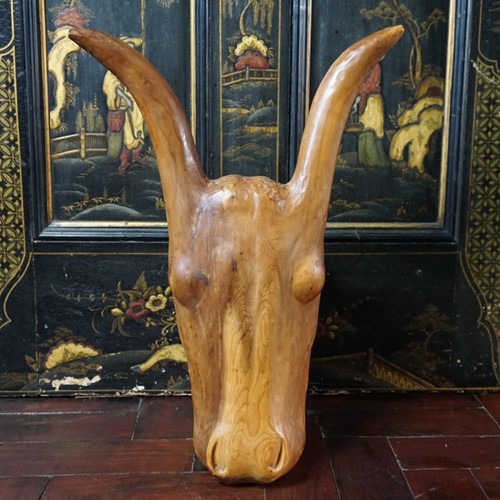 A Carved Head Of An Ox