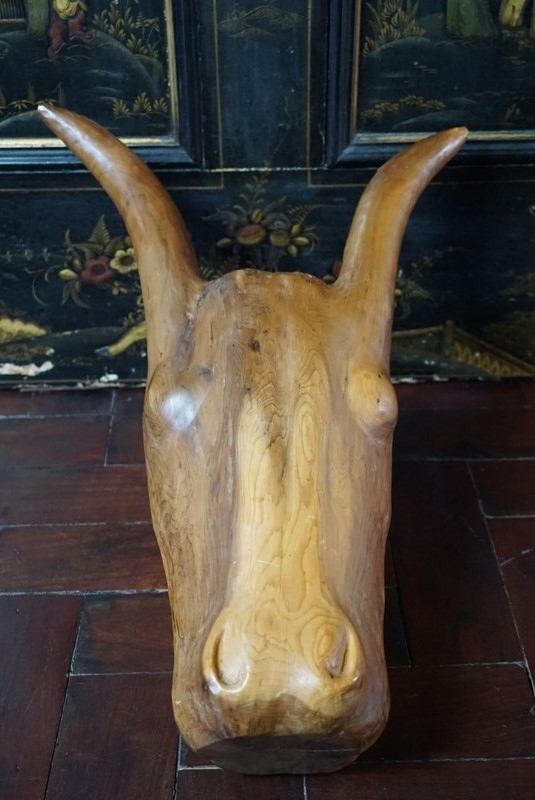 A carved head of an ox-no43collectables-dsc02633-main-637837234370935447.JPG