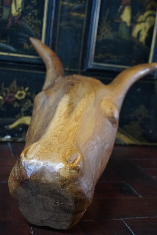 A carved head of an ox-no43collectables-dsc02636-main-637837234363279676.JPG