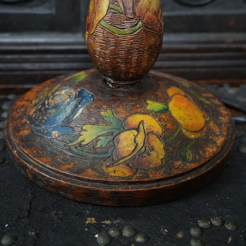 A wooden polychrome floral table lamp