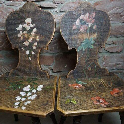 Pair of hand painted Swiss hall chairs