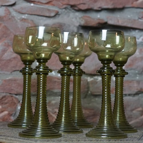 A Set Of Six German Green Glass Roemers