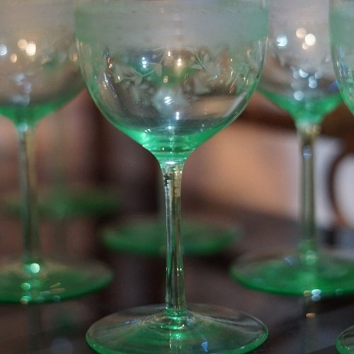 A Set Of Eight Green Uranium Wine Glasses 