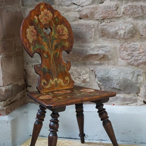 A Swiss Hand Painted Hall Chair