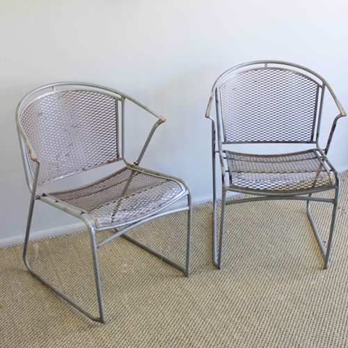 Pair of grey metal garden side chairs