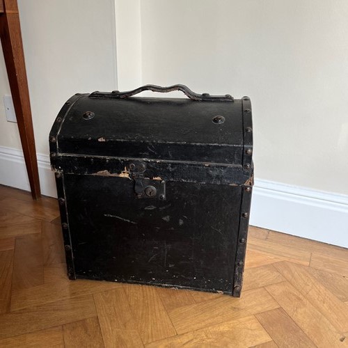 An edwardian canvas and leather small travel trunk