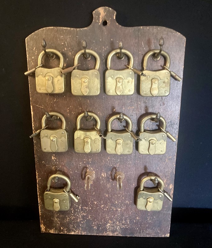 Brass pad locks on wooden shop board-pretty-blue-floral-b100bc5d-ae48-45de-a3f9-487deda5942b-main-637941821736523237.jpeg