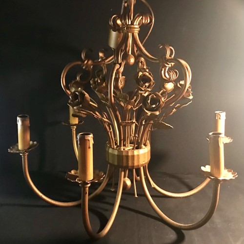 Large 6 arm gilt chandelier with Roses.