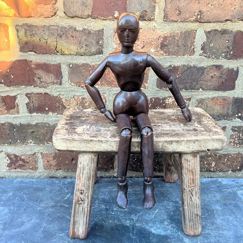 Curved Seated Stool.