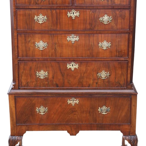 Georgian figured walnut chest of drawers on stand