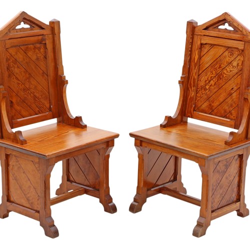 Pair of Gothic pitch pine throne side chairs