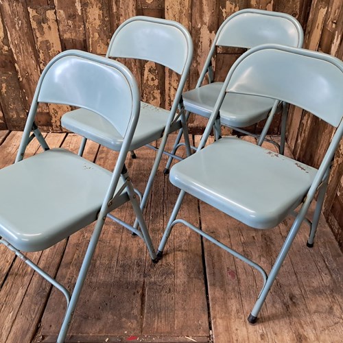 Set Of Four Metal Folding Chairs