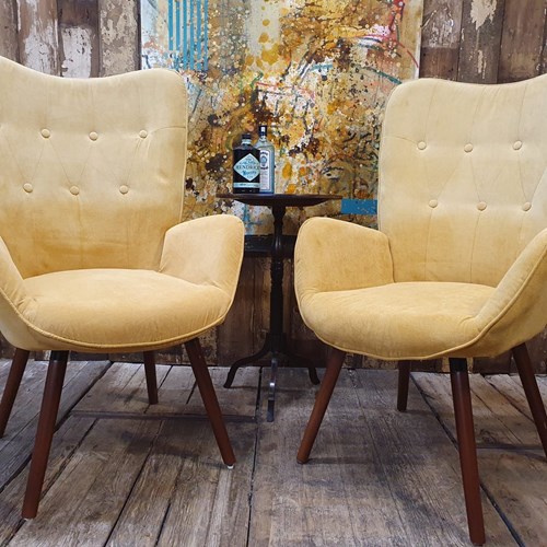 Pair Of Mid Century Style Wing Back Armchairs