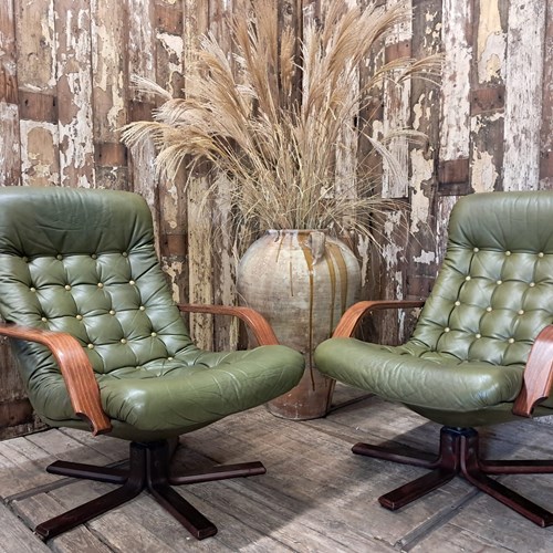 Pair Of Danish Swivel Chairs