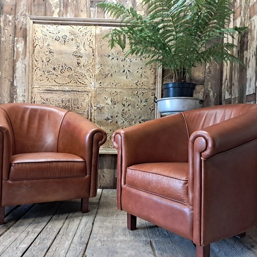 Pair Of Leather Tub Chairs