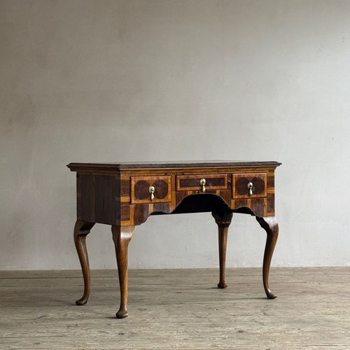 Oyster Veneered Low Boy