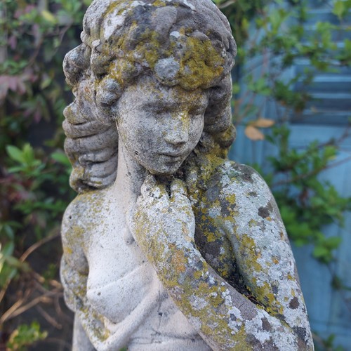 Mid century statue of young girl.