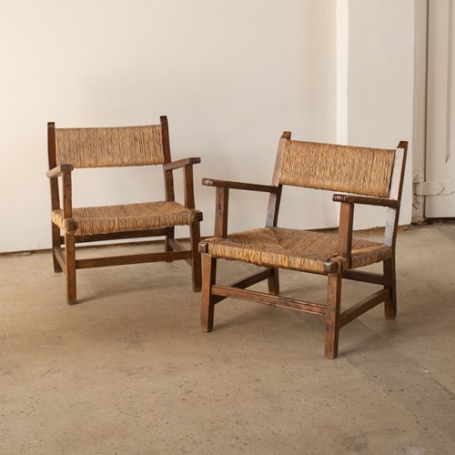 A Pair Of Catalan Armchairs In Chestnut With Original Rush C1940