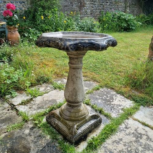 Weathered Cast Stone And Scroll Design Bird Bath