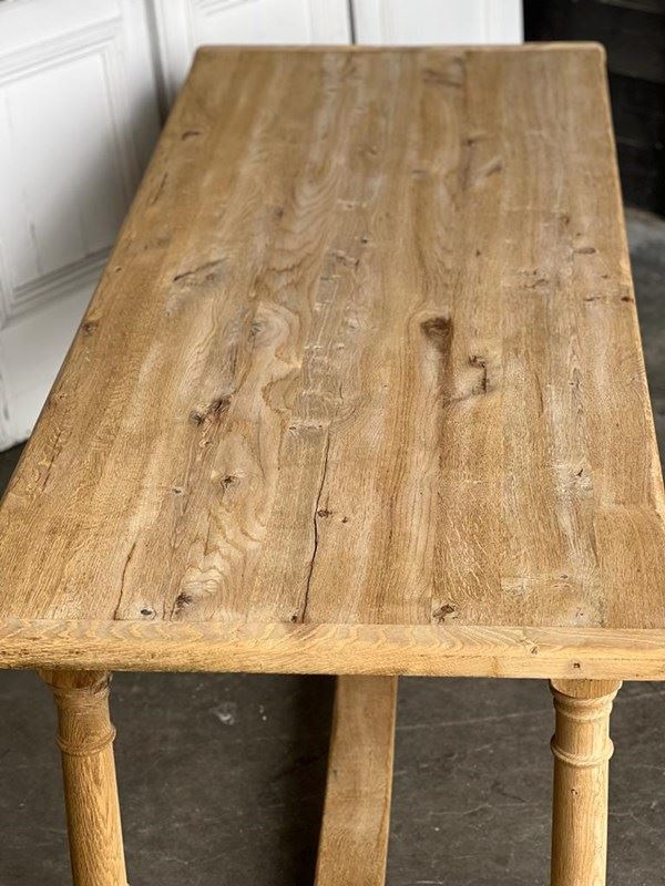 French Bleached Oak Farmhouse Dining Table -sussex-antiques-and-interiors-cf59ecee-6aba-40d5-ba99-82b86a3b2b9b-main-638182882708041603.jpeg