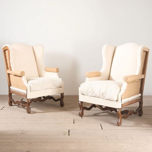 Pair Of Early 20Th Century Os De Mouton Wingback Armchairs
