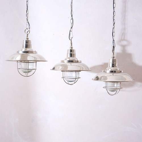 Trio Of 20Th Century Chrome Pendant Lights