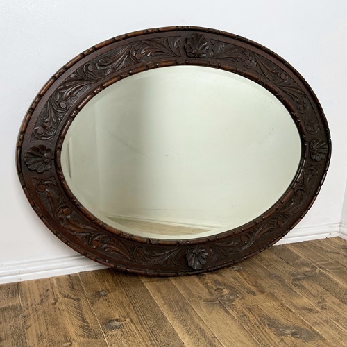Carved Oak Oval Mirror