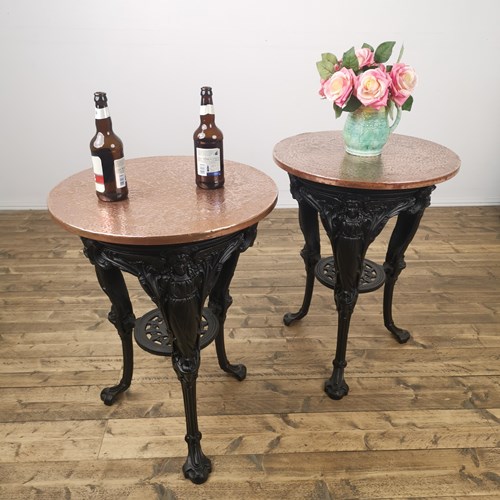 Pair Of Hammered Copper Topped Angel Cast Iron Bases