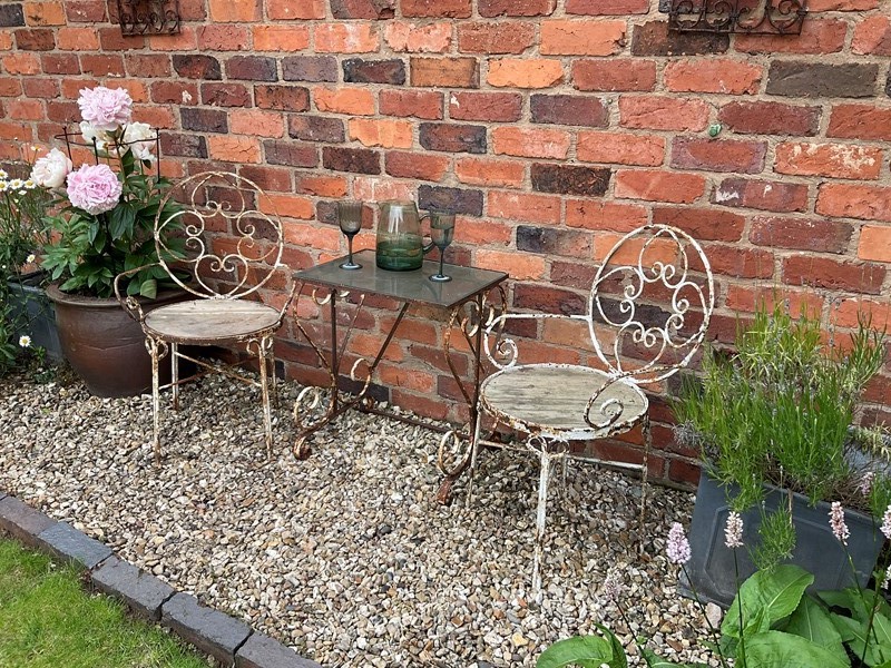 A lovely pair of French Garden Chairs and table-that-vintage-place-e4a74217-a08f-48f9-836e-3262985b20a9-main-637912364267206115.jpeg
