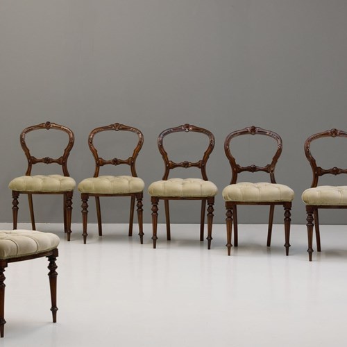 Six Walnut Chairs